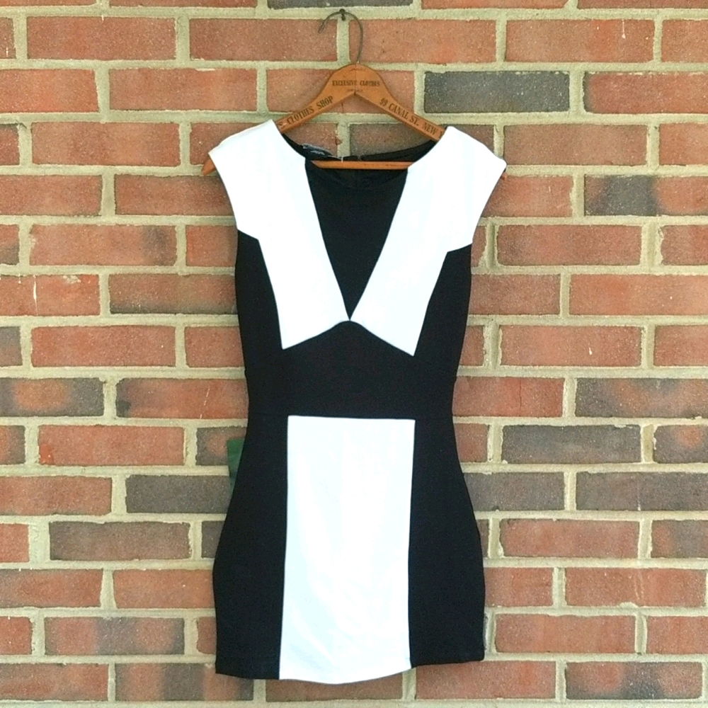 Brand new black and white BeBe dress